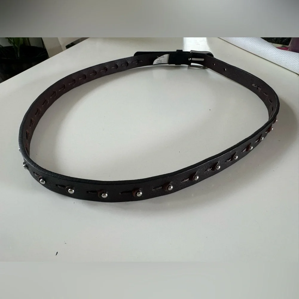 Genuine, leather women’s belt, with silver studs